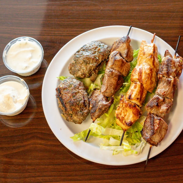 Zest Mediterranean Cuisine's grilled kofta, beef, and chicken skewers with dipping sauces.